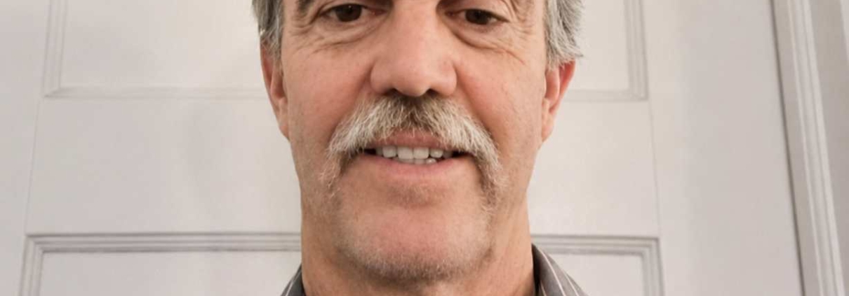 Portrait photo of a Christian Leaders Institute student smiling indoors