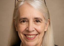 Adult woman smiling in a professional portrait, representing a second-career ministry student