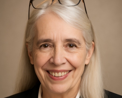 Adult woman smiling in a professional portrait, representing a second-career ministry student