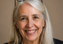 Adult woman smiling in a professional portrait, representing a second-career ministry student