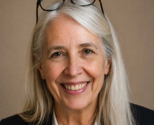 Adult woman smiling in a professional portrait, representing a second-career ministry student